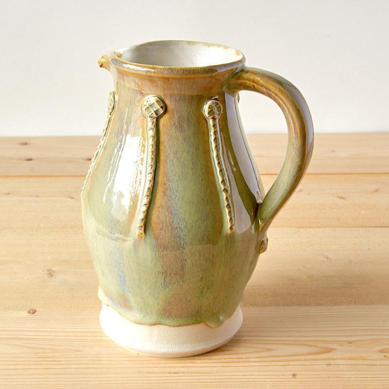 Stoneware jug with wood ash glaze