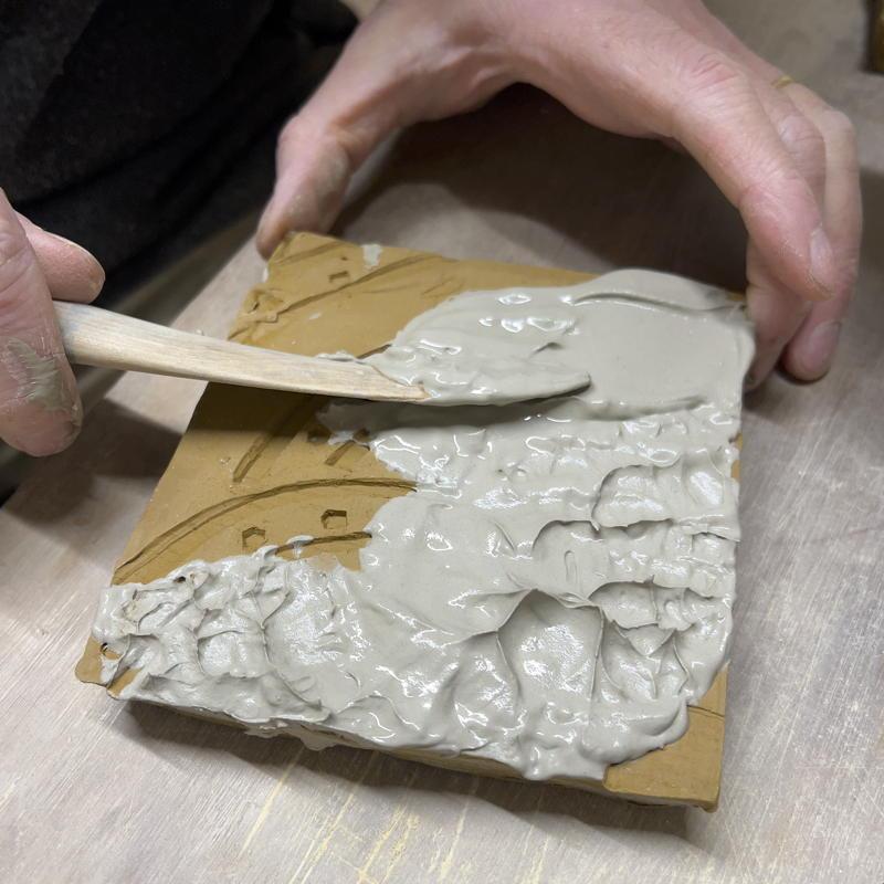 Applying white clay as a paste